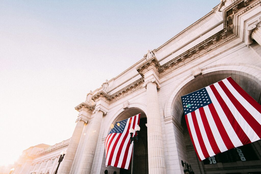 United States Flags hanging from a building in Washington D.C.